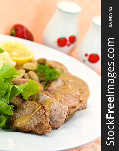 Tenderloin steak with mushroom creme sauce.