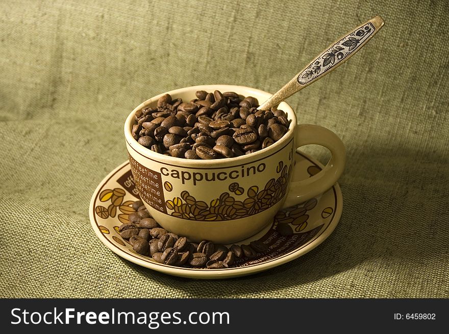 Coffee beans in the cup