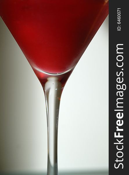 Macro shot of red martini cocktail on classic glass