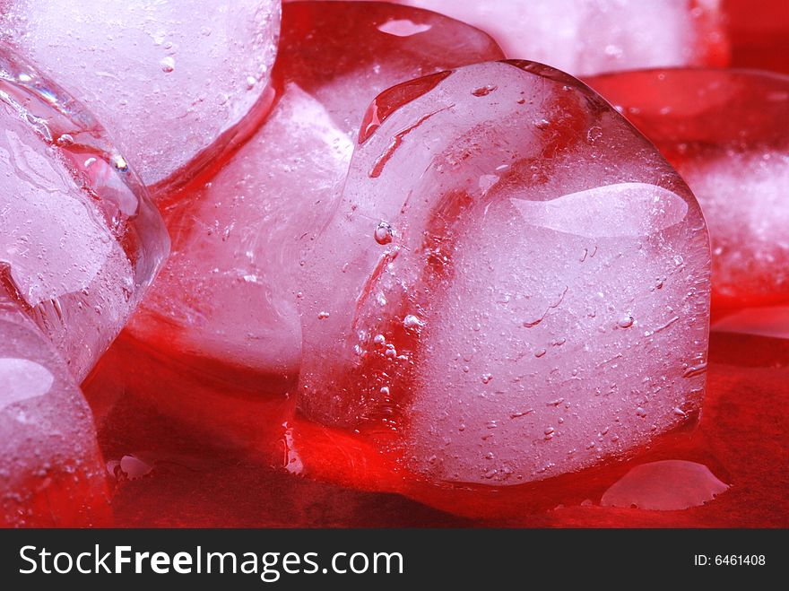 Ice cubes in red background. Ice cubes in red background