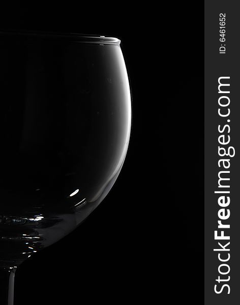 Drinking glass in black background