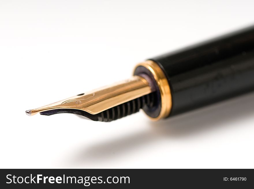 Macro image of fountain pen isolated over white