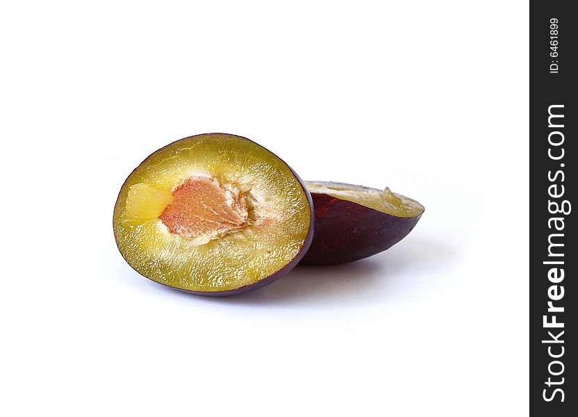 Ripe plums isolated on a white background. Ripe plums isolated on a white background