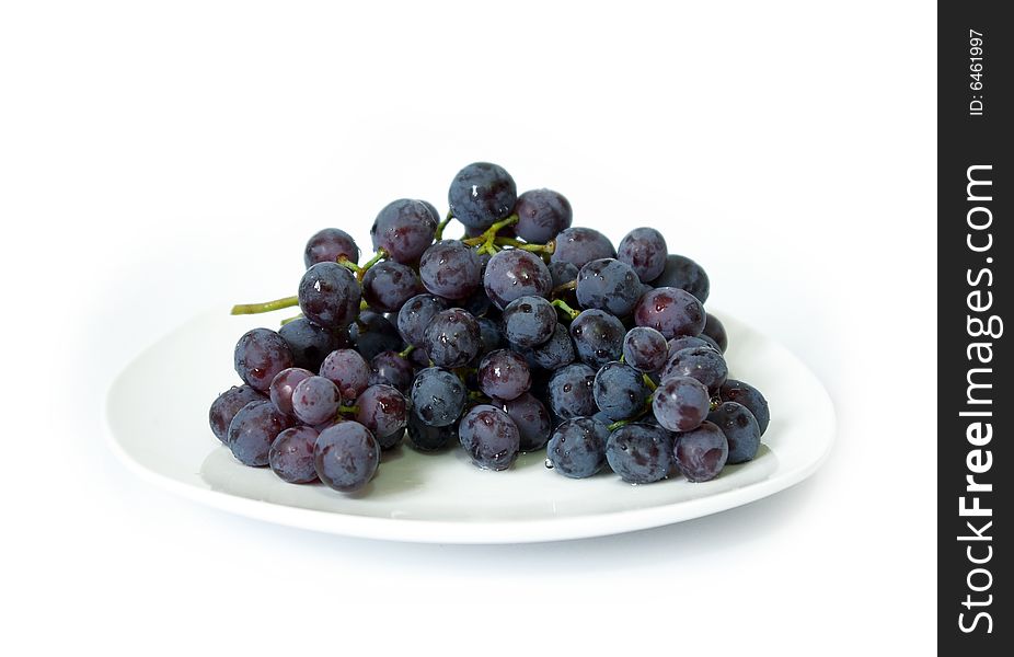 Ripe black grapes isolated