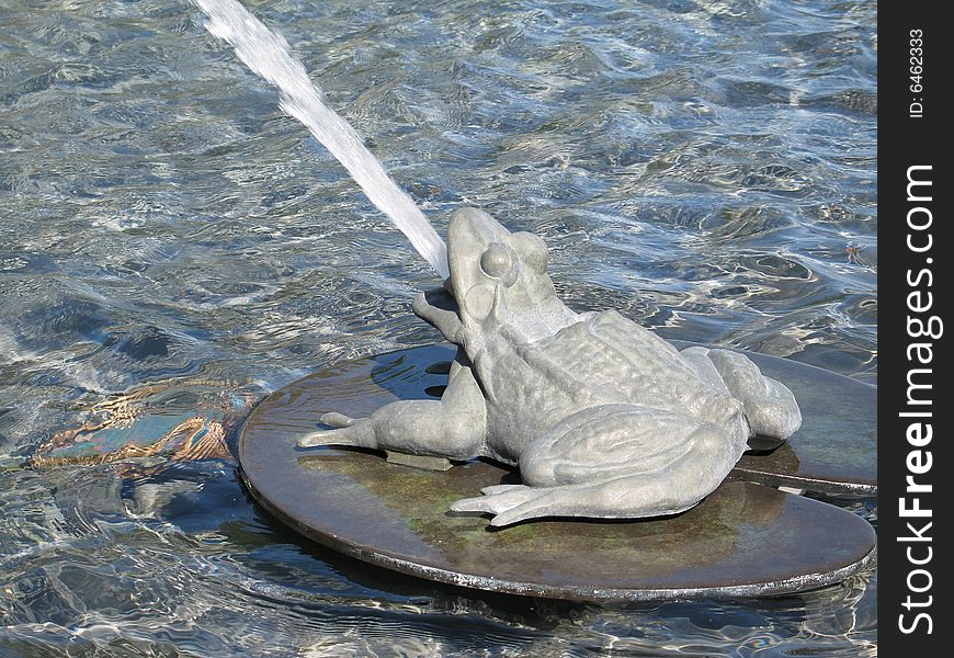 Frog fountain in a park