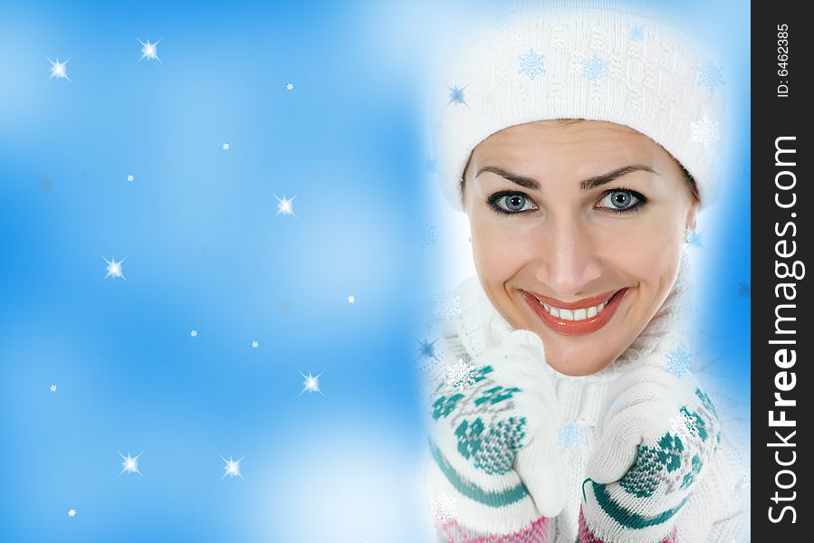 Beautiful woman in white sweater on insulated background