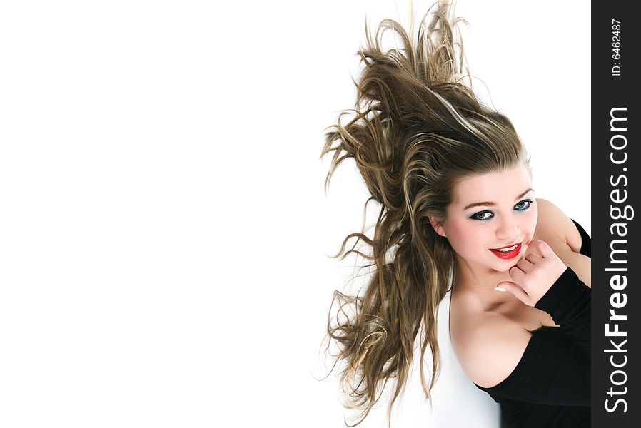 Beautiful girl in black dress on white background