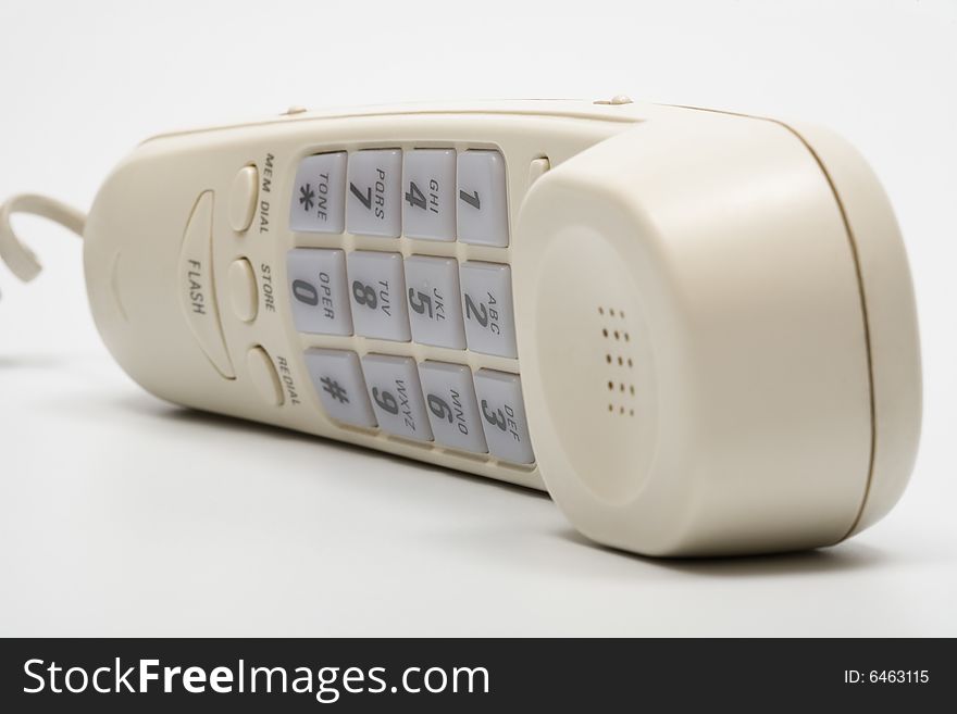 Beautiful and modern white telephone receiver close-up