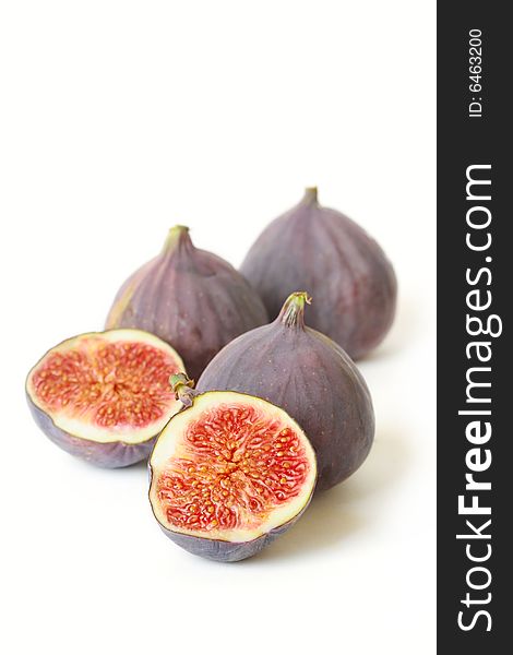 Closed-up of figs on white background