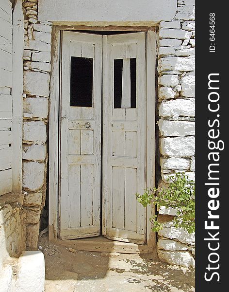 Old wooden door detail in Cyclades