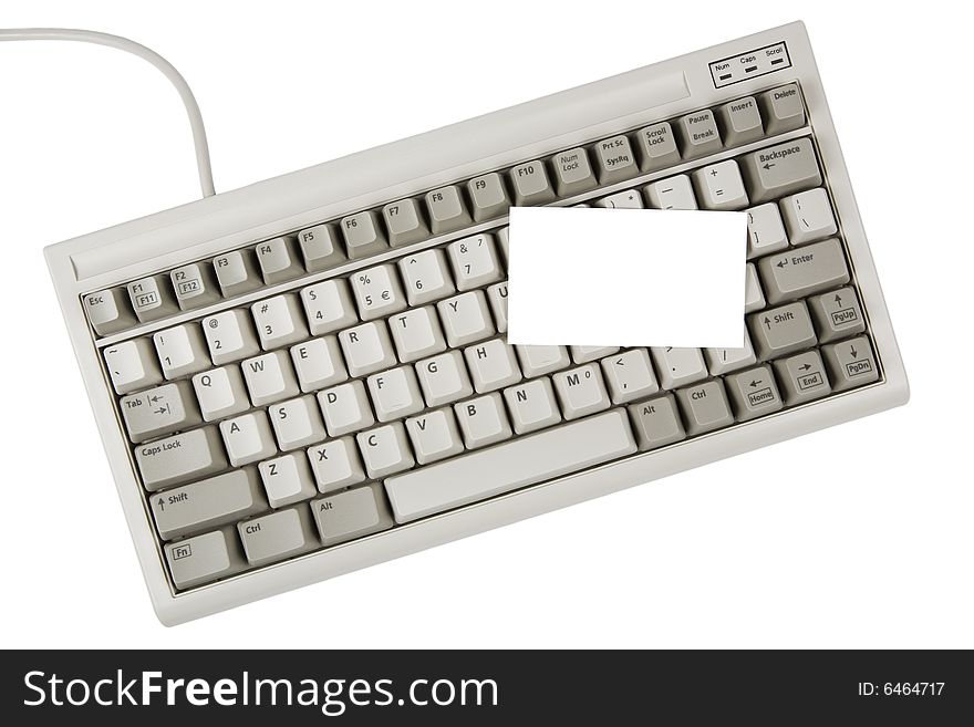 Computer keyboard and blank business card