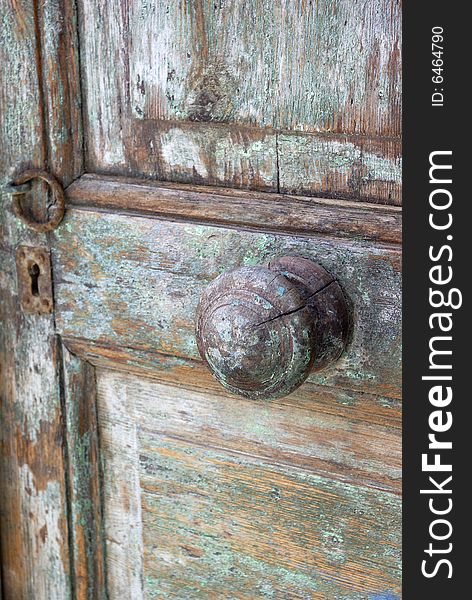 Old wooden door detail in Cyclades. Old wooden door detail in Cyclades