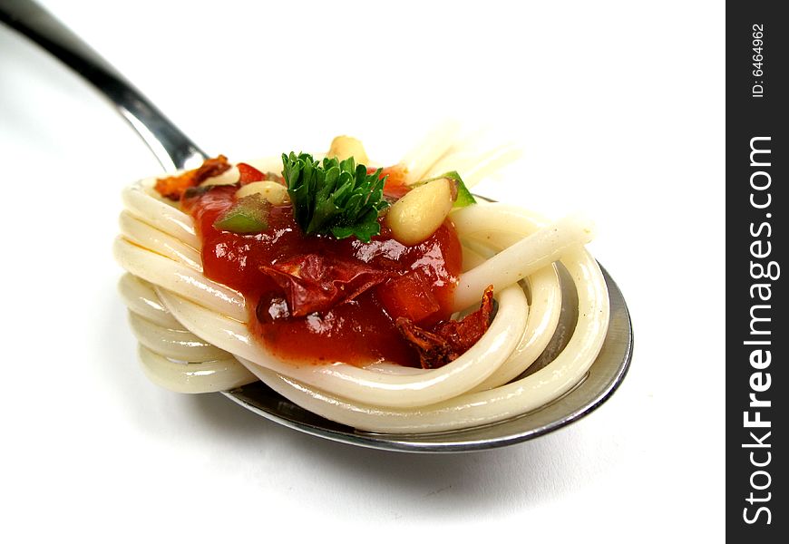 Spoon with spaghetti