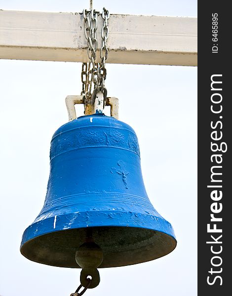 Old traditional bell hanging outside an orthodox church in Greece