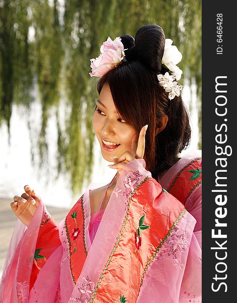 A girl in Chinese ancient dress. 
She is so beautiful. A girl in Chinese ancient dress. 
She is so beautiful.