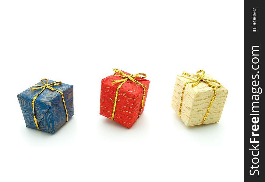 Three colour gift boxes isolated on white background