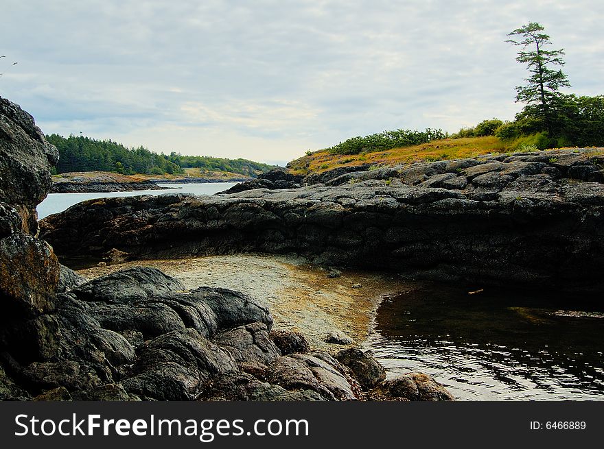 Rocks on the ocean coast at low tides. Rocks on the ocean coast at low tides