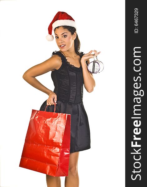 sassy young lady shopper with Santa hat, isolated on white