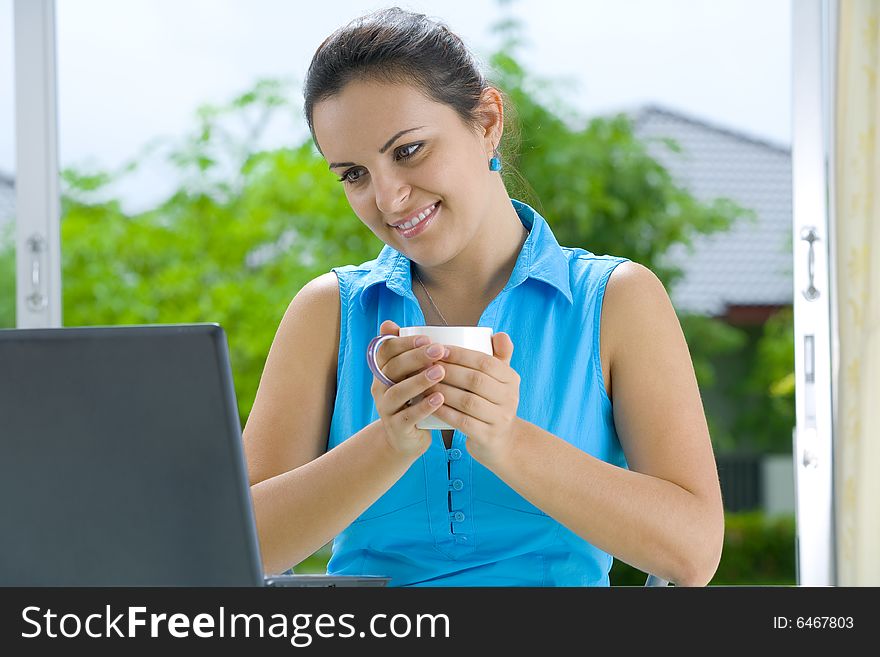 Portrait of young beautiful woman with her laptop. Portrait of young beautiful woman with her laptop