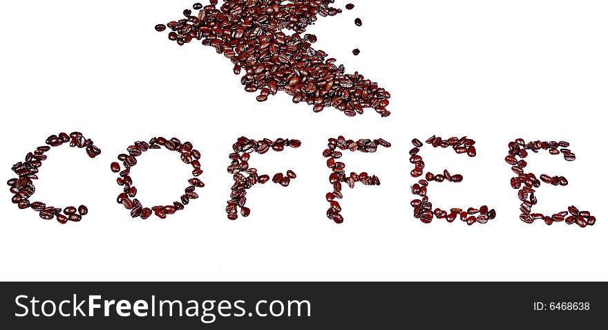 The word coffee written out in beans isolated on a white background. The word coffee written out in beans isolated on a white background