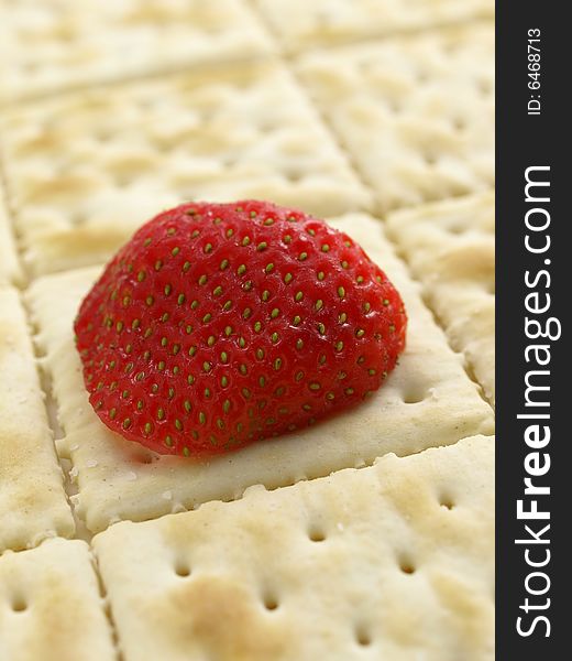 Strawberry half on a sheet of Crackers