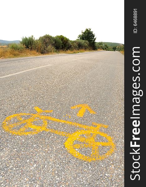 Yellow bicycle sign on the road to Santiago. Yellow bicycle sign on the road to Santiago