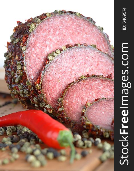 Delicious salami with spice, pepper and chili. Delicious salami with spice, pepper and chili