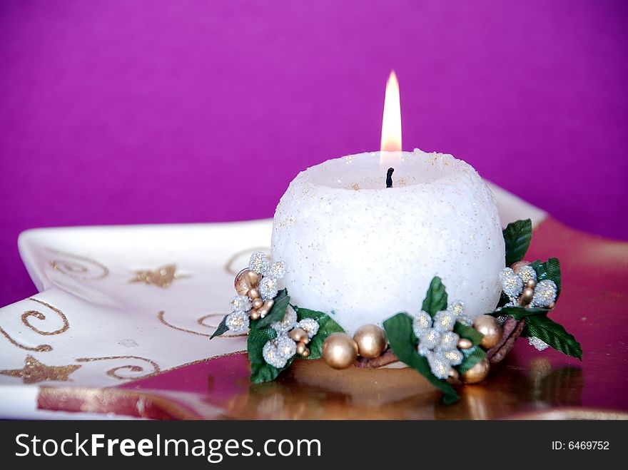 A candle with candle holder. A candle with candle holder