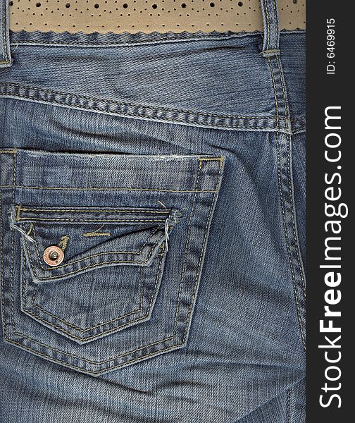 Close up of jeans back pocket.