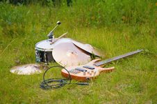 Musical Instruments, Guitar, Drum, Plates On Grass Stock Image Musical Instruments, Guitar, Drum, Plates On Grass Stock Image