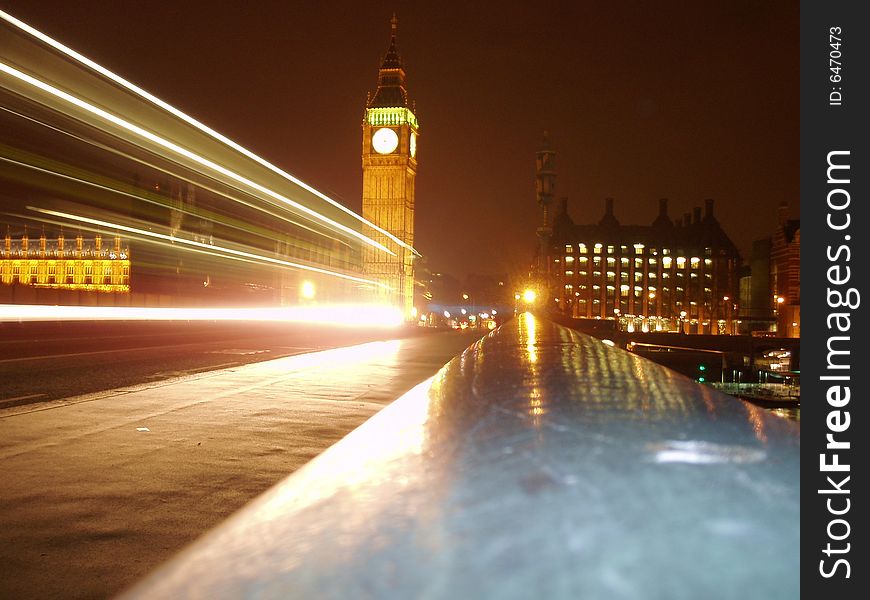 Londons Big Ben form bridge with passing lights