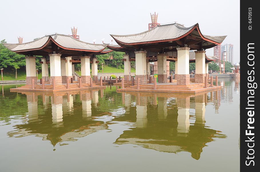 Two pavilions built in the middle of the water lake. Two pavilions built in the middle of the water lake.