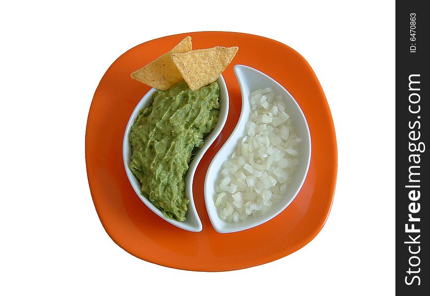 Dish with guacamole and onion bowl