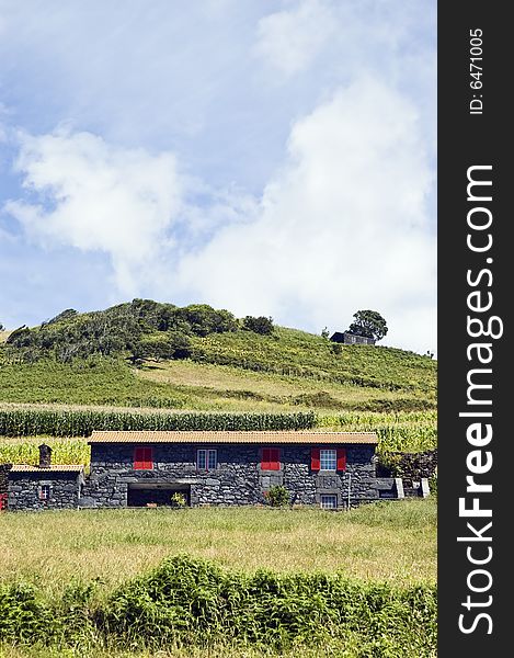 Beautiful farmhouse in a green landscape of Pico island, Azores, Portugal. Beautiful farmhouse in a green landscape of Pico island, Azores, Portugal