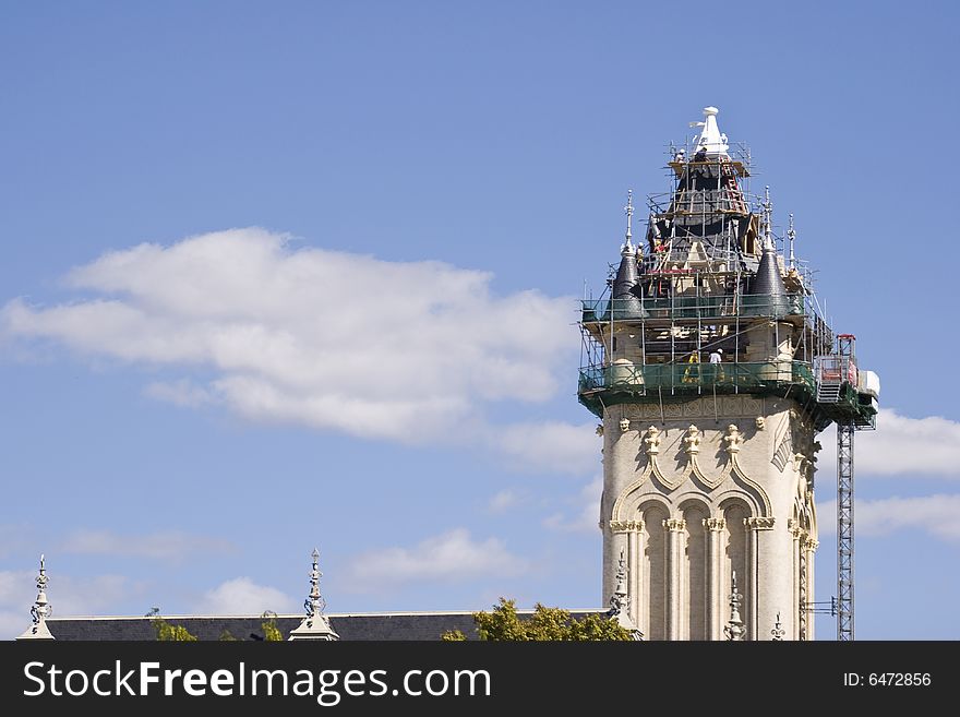 Architectural restoration project of tower with blue sky and clouds. Architectural restoration project of tower with blue sky and clouds