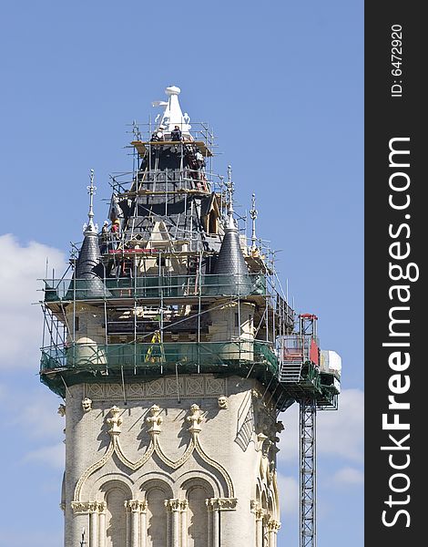 Architectural restoration project of tower with blue sky and clouds. Architectural restoration project of tower with blue sky and clouds