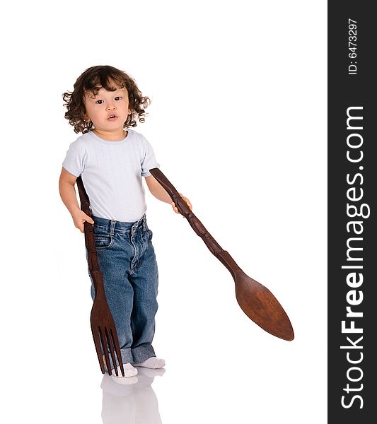 Child with big spoon and fork