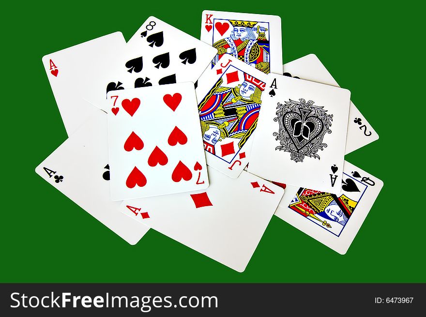 Set of cards isolated on green with clipping path