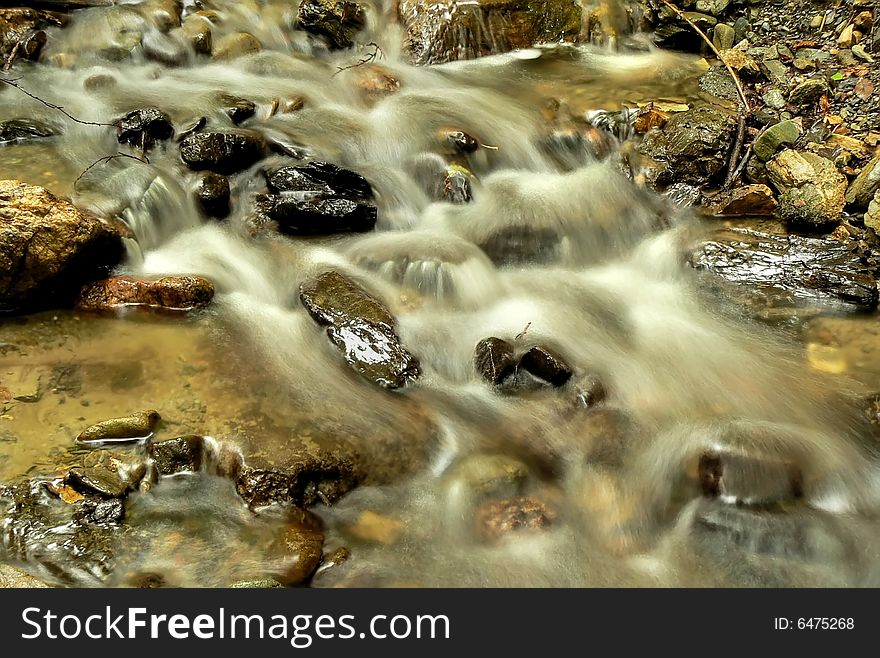 Beautiful stream water cascades in HDR