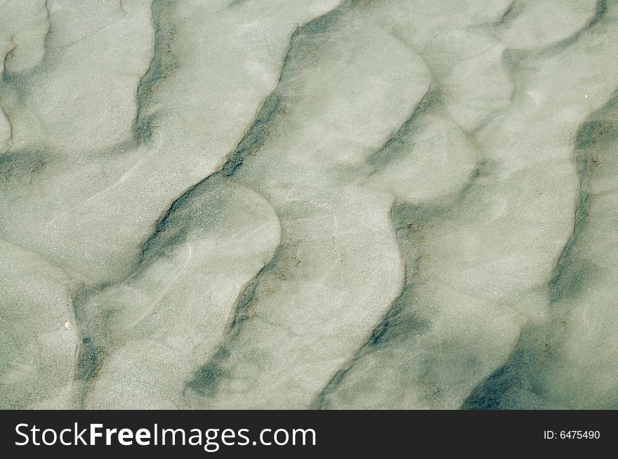 Natural patterns in grey sand. lovely background image. Natural patterns in grey sand. lovely background image.