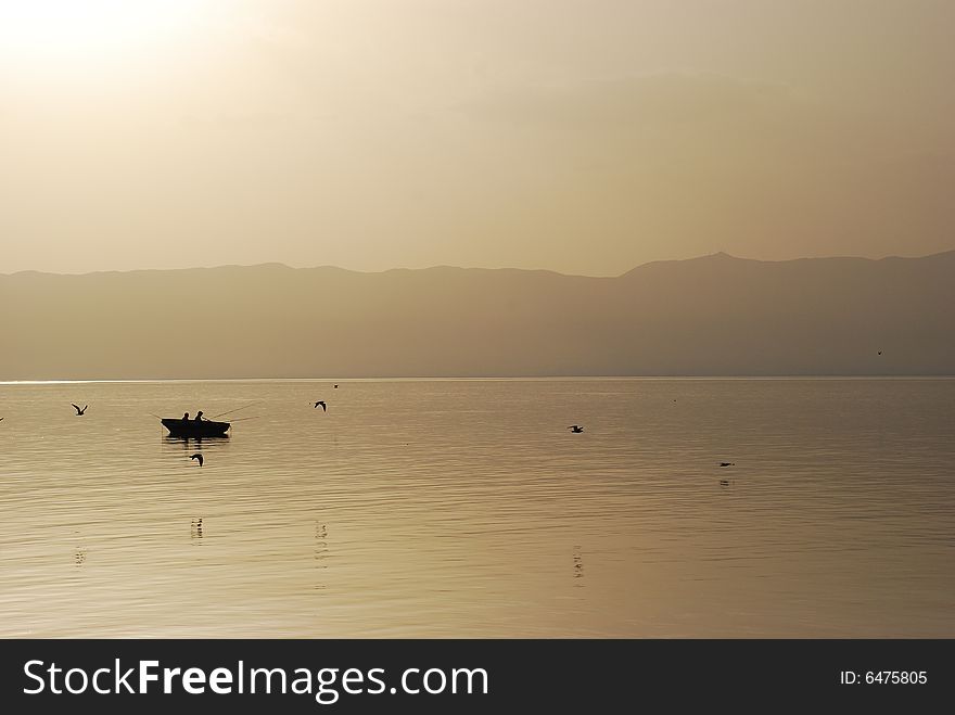 Fishing at sunset on Ohrid Lake, Macedonia. Fishing at sunset on Ohrid Lake, Macedonia
