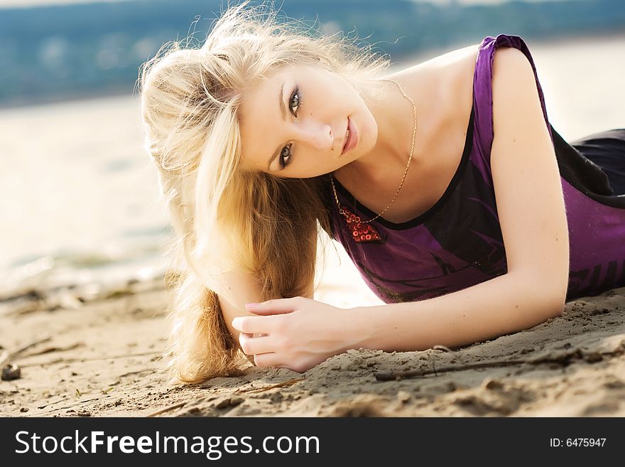 Portrait of beautiful woman on the beach. Portrait of beautiful woman on the beach