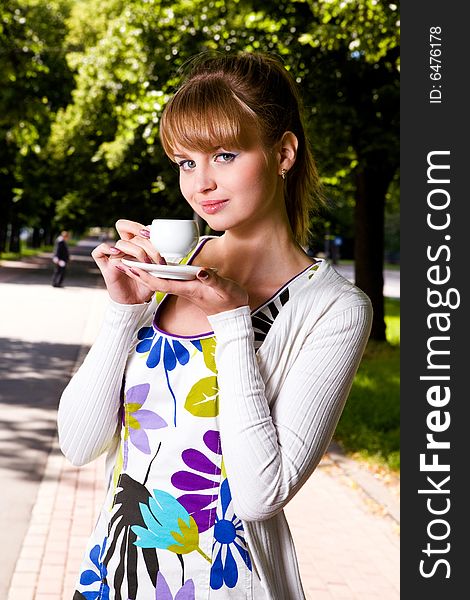 Beautiful young woman and coffee