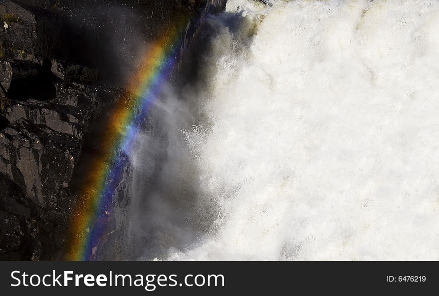 A Rainbow over a waterfall