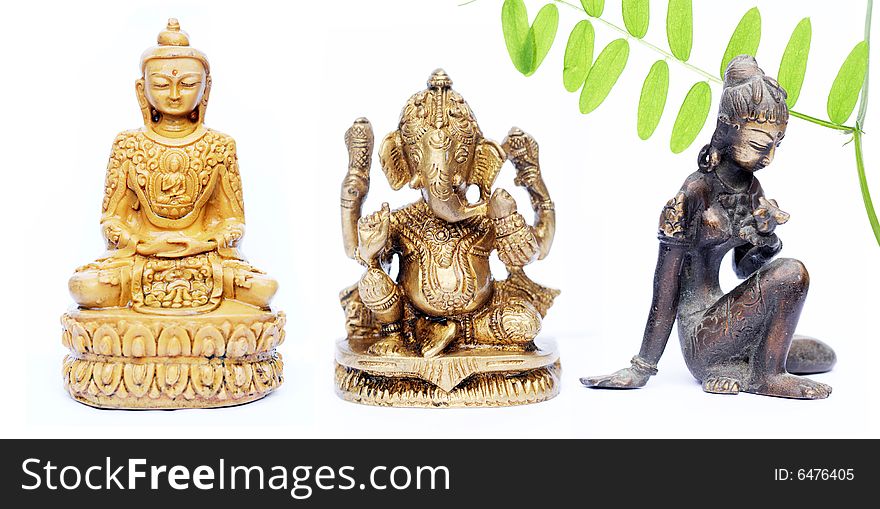 Lovely figures of buddha, ganesh and an indian girl against white background. Lovely figures of buddha, ganesh and an indian girl against white background