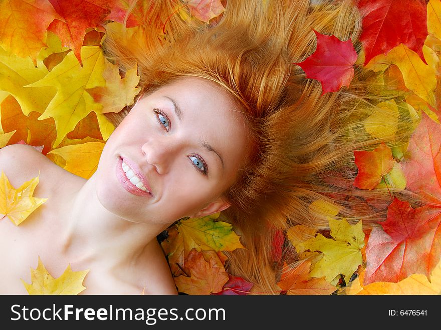 Sensuality girl with red hair in the leaf. Sensuality girl with red hair in the leaf