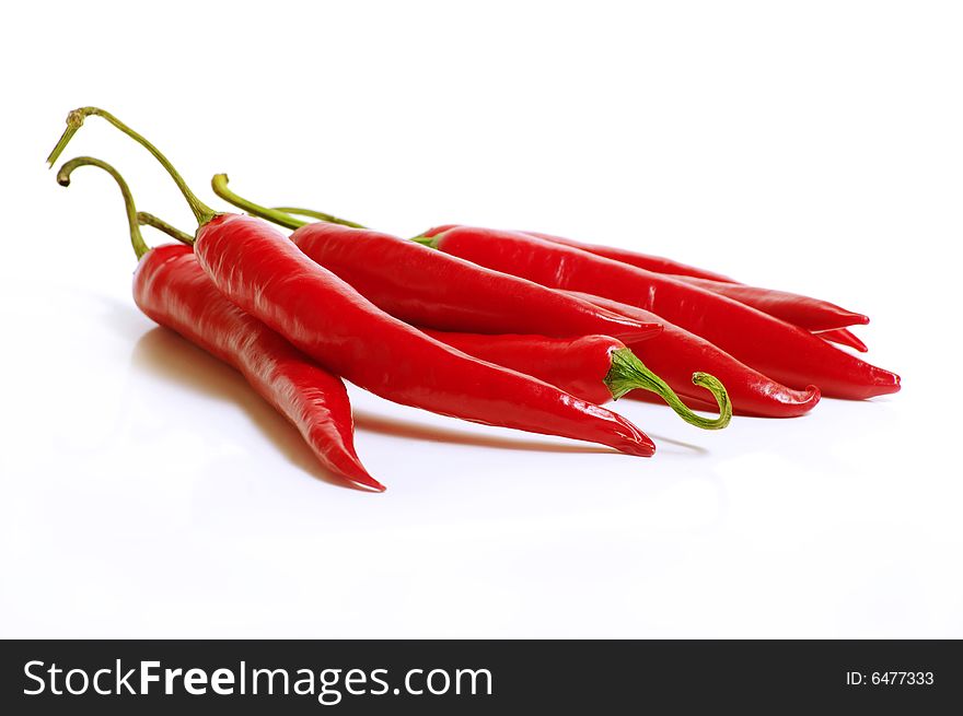 Group of red pepper on the white. Group of red pepper on the white