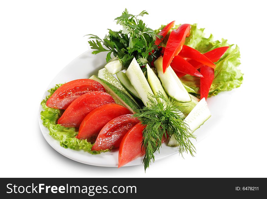 Fresh Vegetables Plate with Parsle, Salad Leaves and Dill. Isolated on White Background