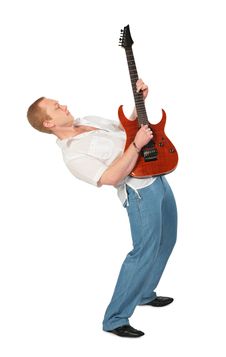 Young Man With Guitar Dancing Stock Photo