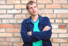 Young Stylish Man Stand Near Brick Wall. Royalty Free Stock Photo Young Stylish Man Stand Near Brick Wall. Royalty Free Stock Photo